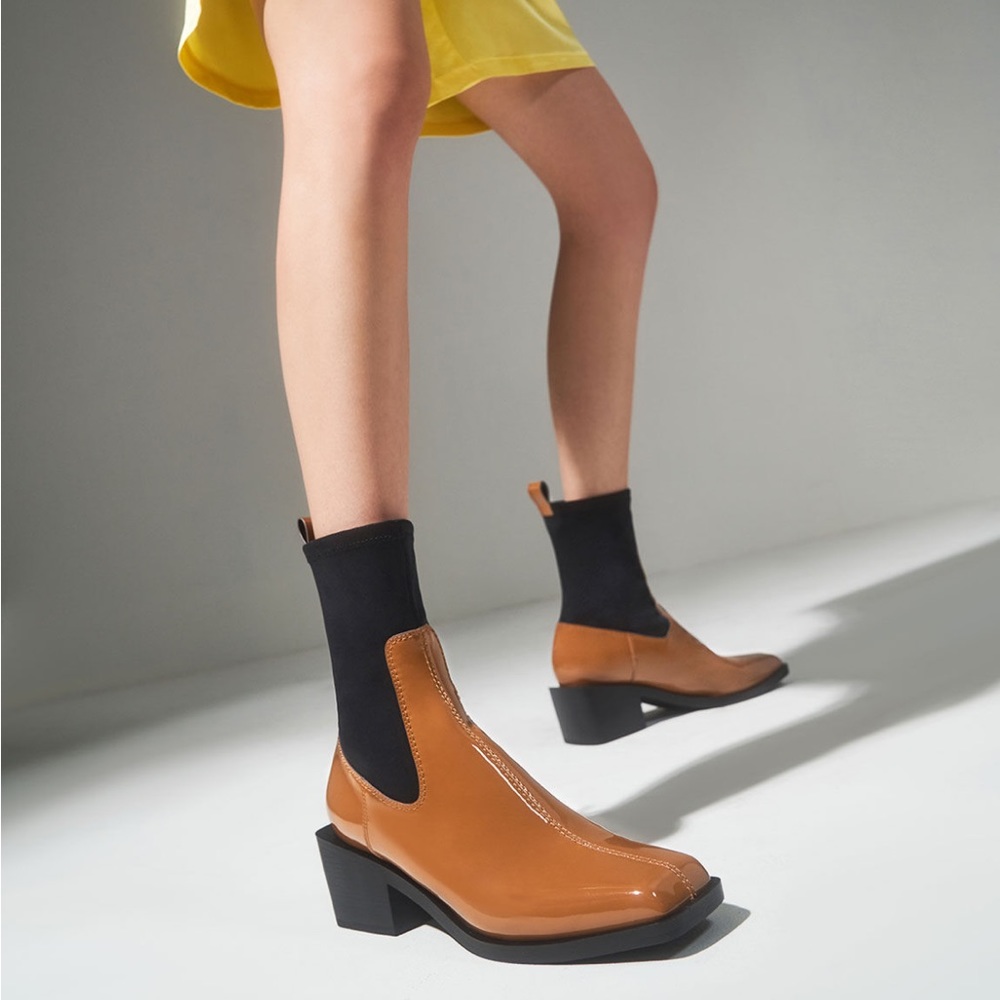 Brown and black sock boots